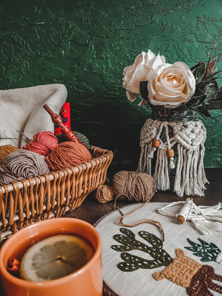 Assorted Rolls of Yarn on Brown Wicker Basket